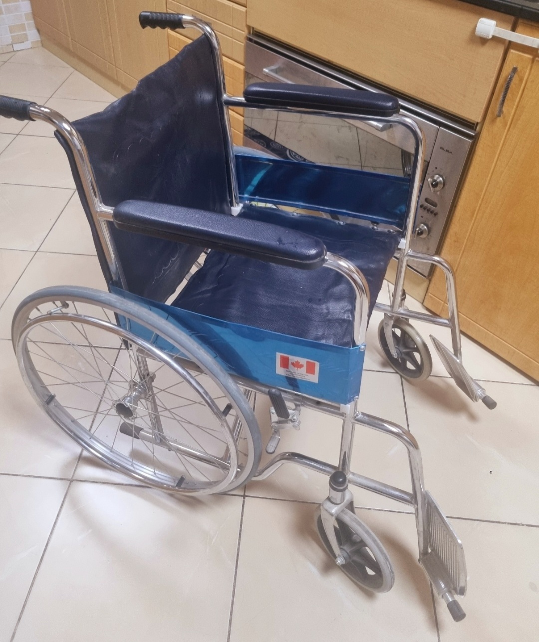 Wheel chair in perfect condition usage less than month