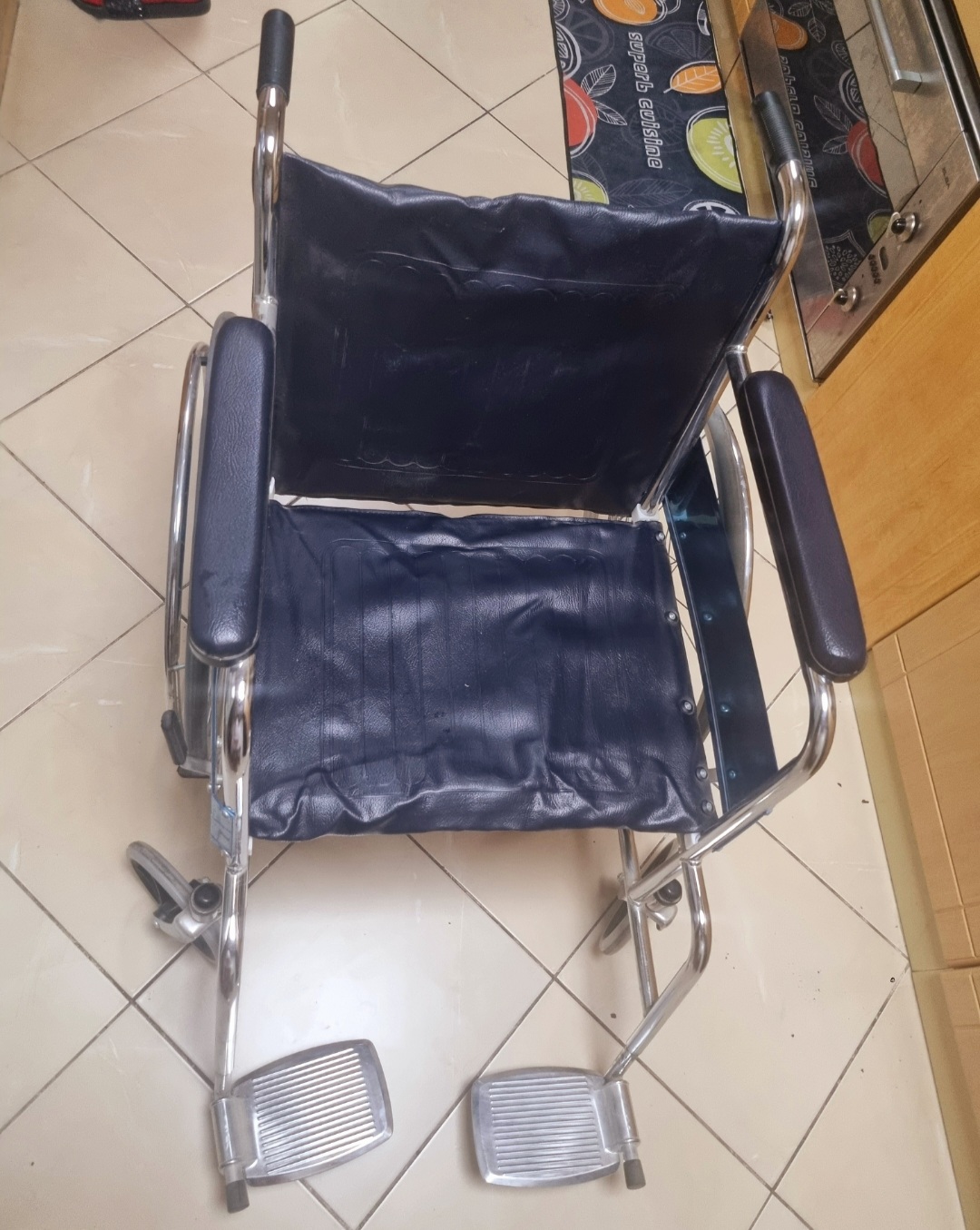 Wheel chair in perfect condition usage less than month