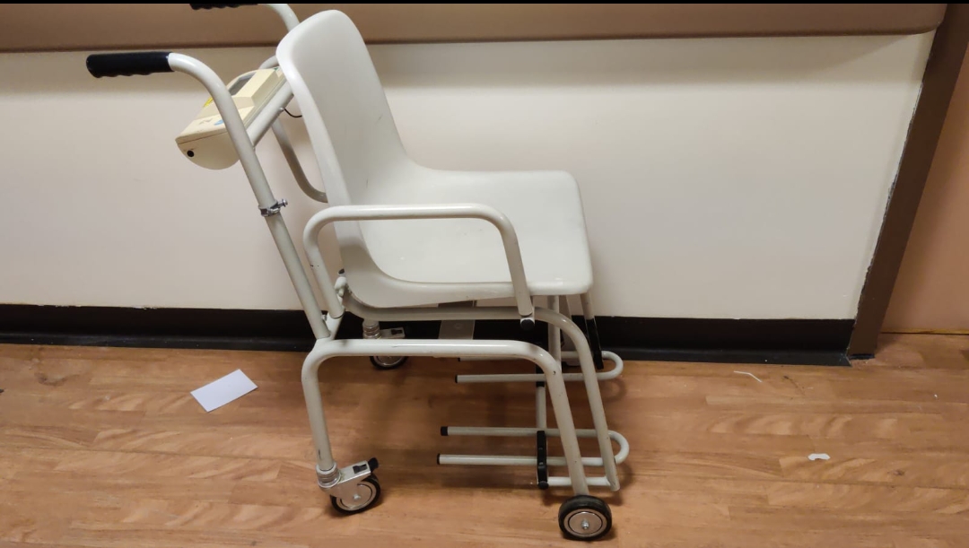 Seca wheel chair with weighing scale