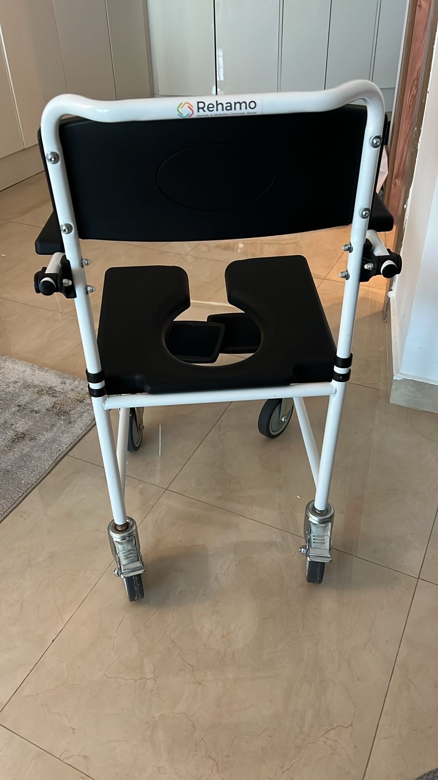 Rehamo Shower Commode chair with Flip Arm and Swing Away Footrest used